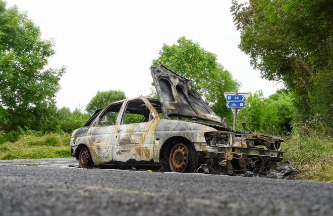 The burnt out car used in the getaway after the shooting at Hotel Carlton, Belleek, on Tuesday morning    RMG03