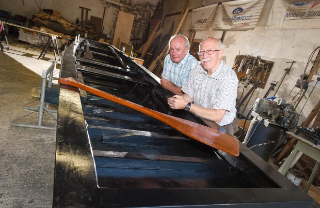 Fred Ternan and Bert Robinson with one of the two cots that was built in the mens shed in Newtownbutler    Picture: Ronan McGrade