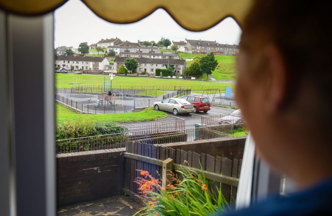 A worried parent looks out at the empty playpark opposite her Derrin Park home in Enniskillen after people in the area have been left worried by the approaches made on their children in recent days    RMG02