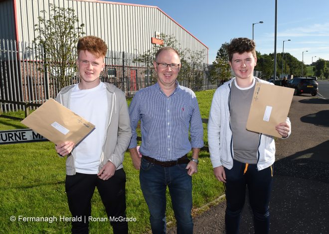 Martin Greene brought his sons Gavin and James to Enniskillen's Royal Mail sorting office to collect their results    Picture: Ronan McGrade