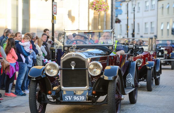 David Hassard and his friend enjoy taking part in the vintage car parade last year    RMG96