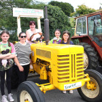 Amanda McManus on her Dads Tractor with Sister Aravon and her Daughters LiIly, Emma, and Edel.