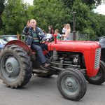 Willie McSurley waves to the large crowd gathered for the run.