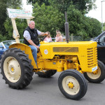 Gary McGrade takes Purdy's tractor for a run.