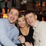 Town mid-fielder Brenda Rogers with Lisa Curran and Sean Morris.