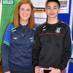 Winner of the Rock runners 5k, Max Murphy, with Runners Club Chairperson, Cathy McCaffrey.