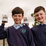 Pictured with the Tumbling Paddies mug are pupils Oln Shannon and Jack OÕReilly
