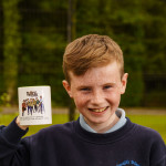 Pictured with the Tumbling Paddies mug is pupil Conor Hallet