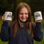 Pictured with the Tumbling Paddies mug is pupil Ciara Barron