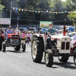 In Full Flow - More tractors pass through Donagh village in the Sunday sunshine