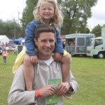 Amelia Lewis hitching a Fathers day ride on daddy Julian at the Enniskillen festival bmcb 27