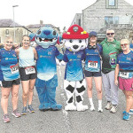 Ready For The Run - Alison Vennard Natalie Ellis, Cliodhna Casey, Sean Conway and Aideen Casey join a couple of furry friends at the start line of the Enniskillen Running Club 10k 2025