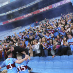 St Michael's supporters celebrate af the end of the game