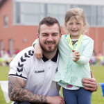 Dad Carl Morrison with Lilly-Ella and her winning race medal bmcb 114